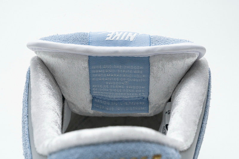 Nike x Sean Cliver SB Dunk Low 'Holiday Special' - Gem Lux