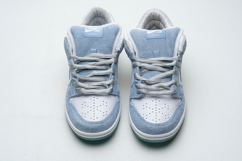 Nike x Sean Cliver SB Dunk Low 'Holiday Special' - Gem Lux