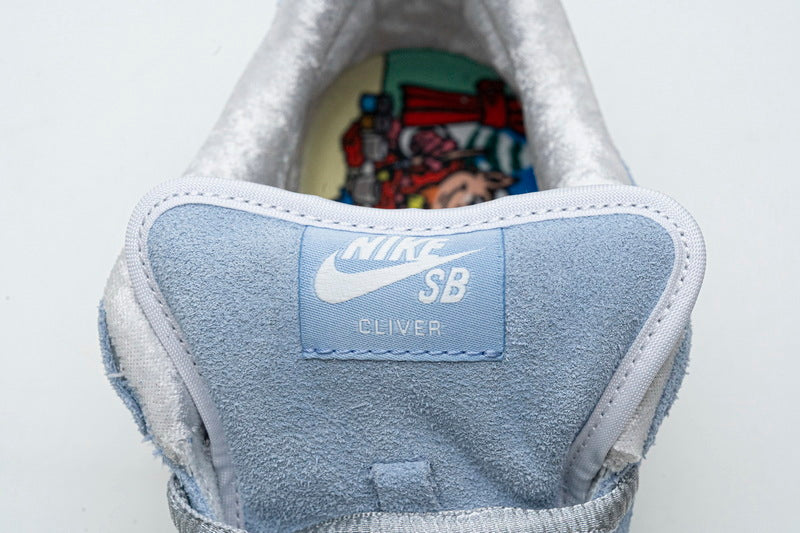 Nike x Sean Cliver SB Dunk Low 'Holiday Special' - Gem Lux
