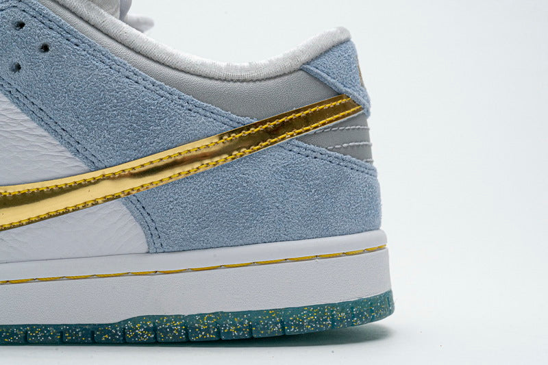 Nike x Sean Cliver SB Dunk Low 'Holiday Special' - Gem Lux