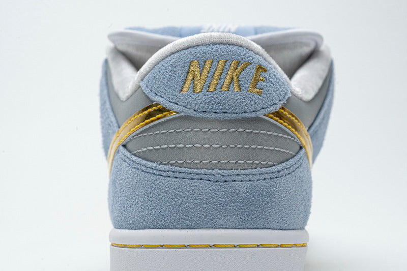 Nike x Sean Cliver SB Dunk Low 'Holiday Special' - Gem Lux