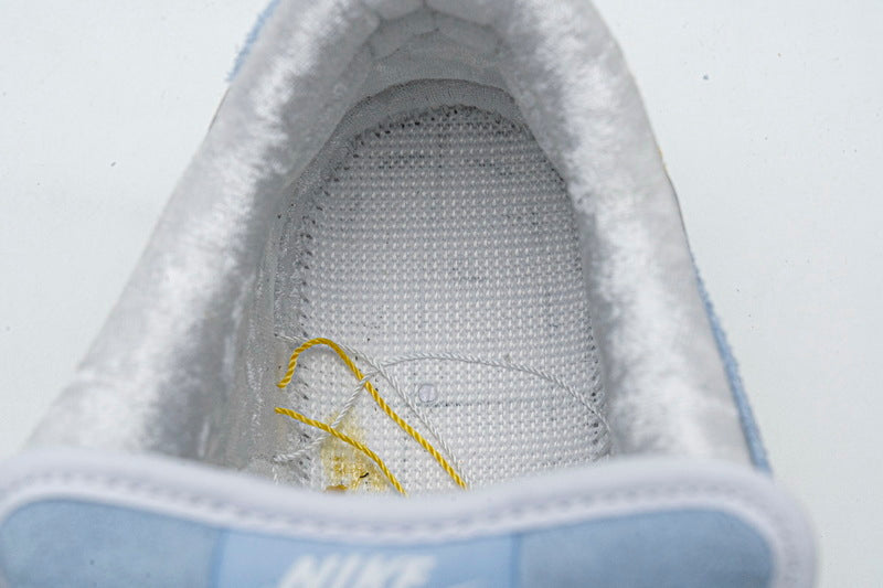 Nike x Sean Cliver SB Dunk Low 'Holiday Special' - Gem Lux